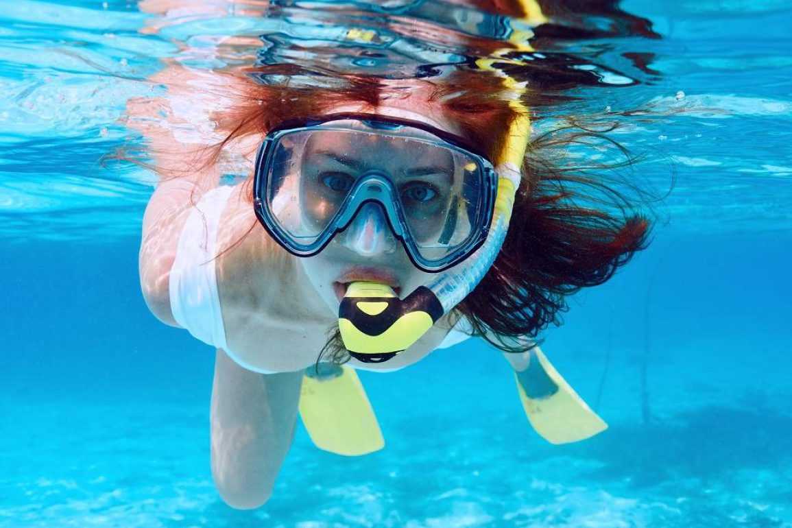 Woman Snorkeling Waterhead