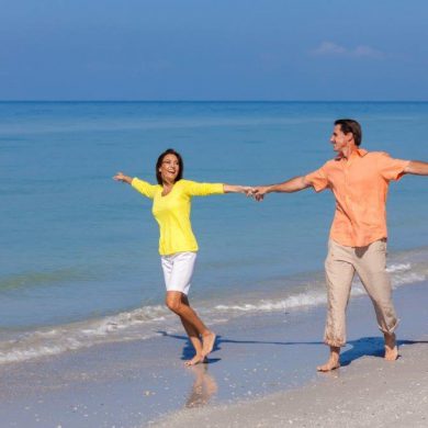 Couple celebrating on beach