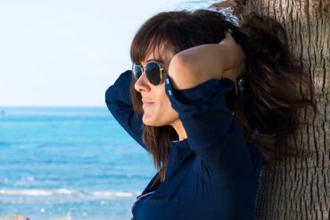 woman with seascape in background