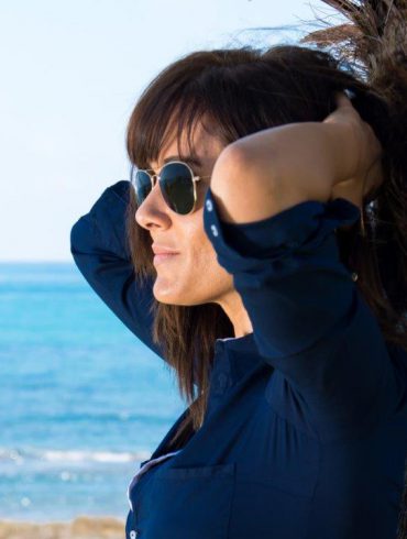 woman with seascape in background