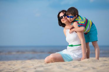 Mother and son on beach