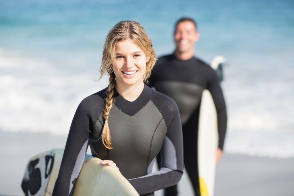 fit surfing couple