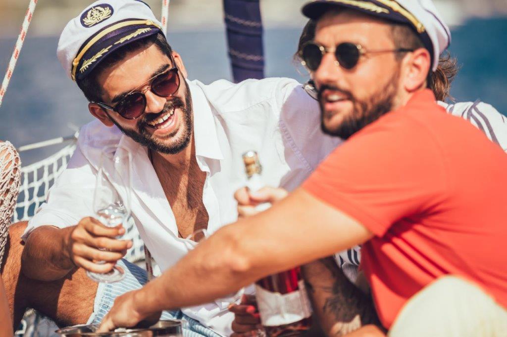 Men wearing boat captain caps