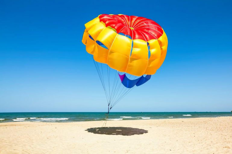 Parasailer taking off from beach
