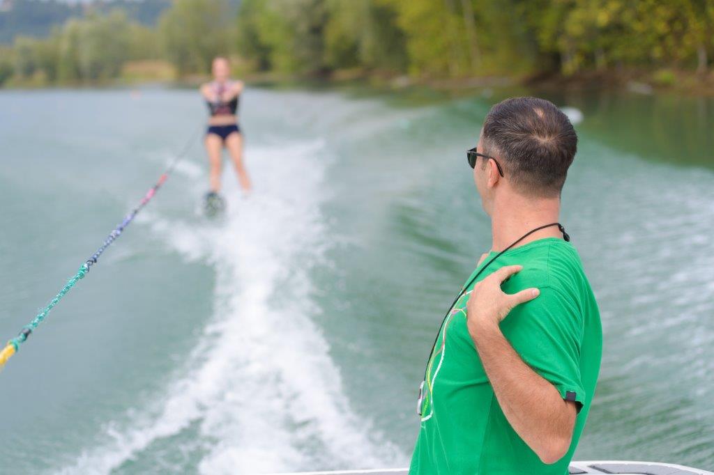 Young woman water skiing