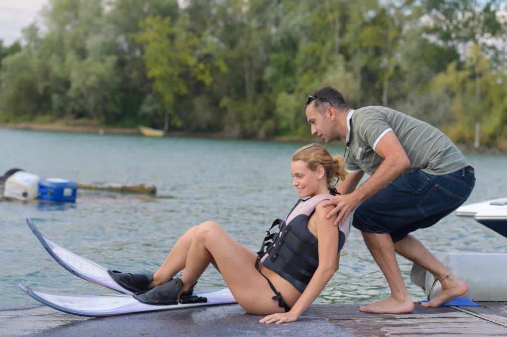 First time water skier learning to get up on the skis