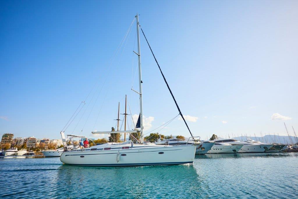 Yachts parking in harbor at sunny day